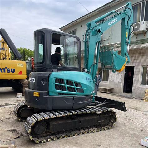 who makes kobelco mini excavators|who owns kobelco excavators.